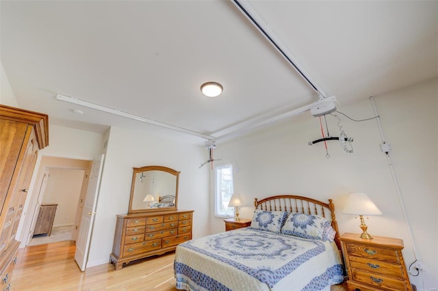 bedroom with light wood-style floors