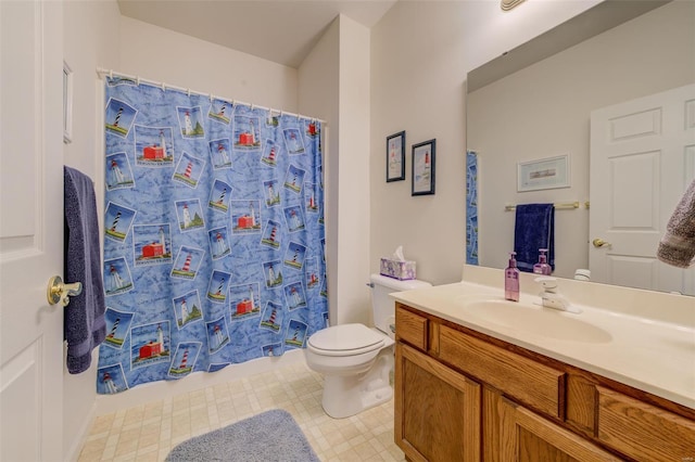 full bath with tile patterned floors, toilet, and vanity