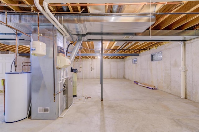 unfinished basement with water heater