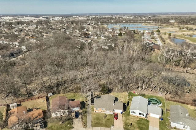 bird's eye view with a residential view and a water view