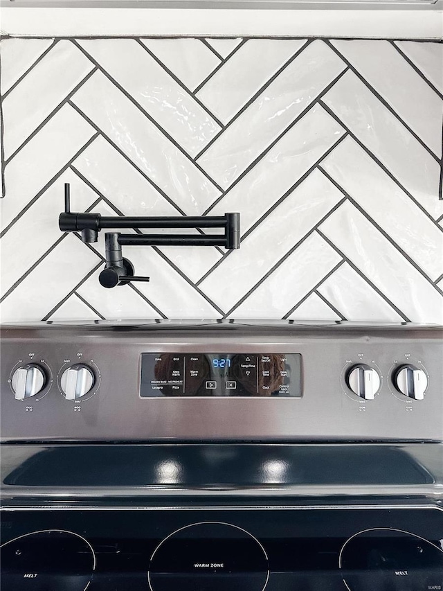 room details featuring stainless steel electric stove