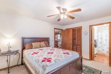 bedroom featuring a closet and a ceiling fan