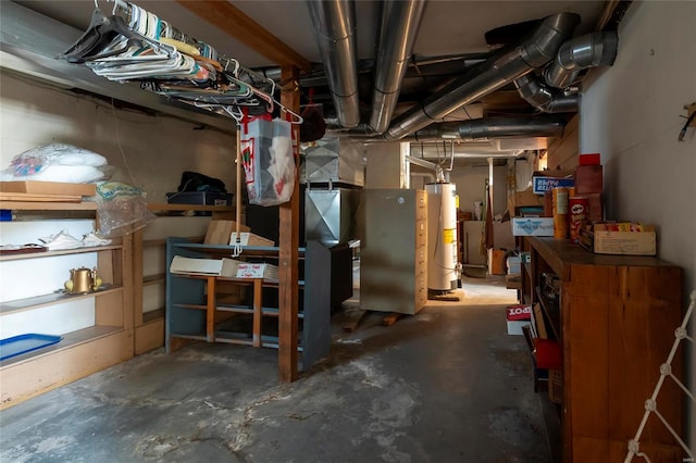 utility room featuring water heater