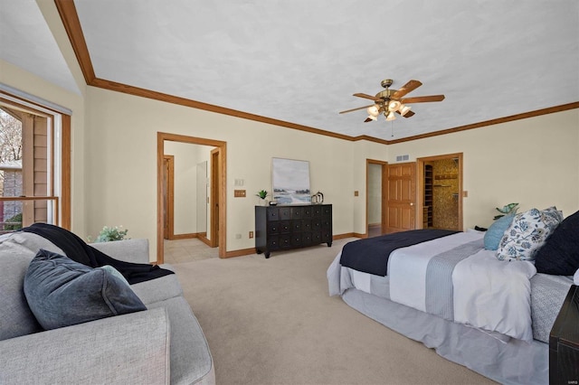 bedroom featuring crown molding, carpet, baseboards, and visible vents