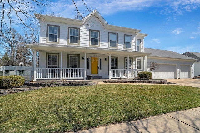 view of front of house featuring fence, driveway, covered porch, a front lawn, and a garage