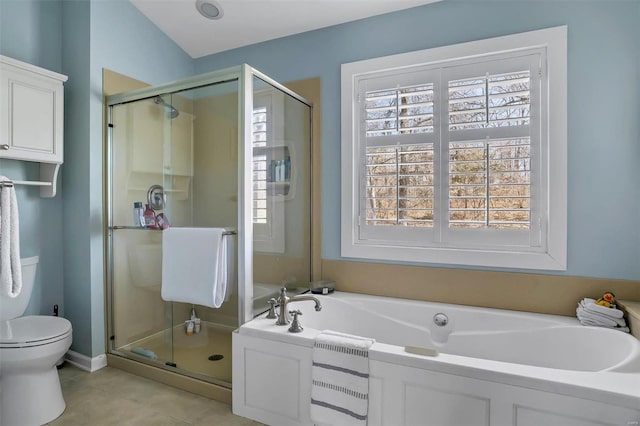 full bath featuring toilet, a shower stall, a bath, and tile patterned floors