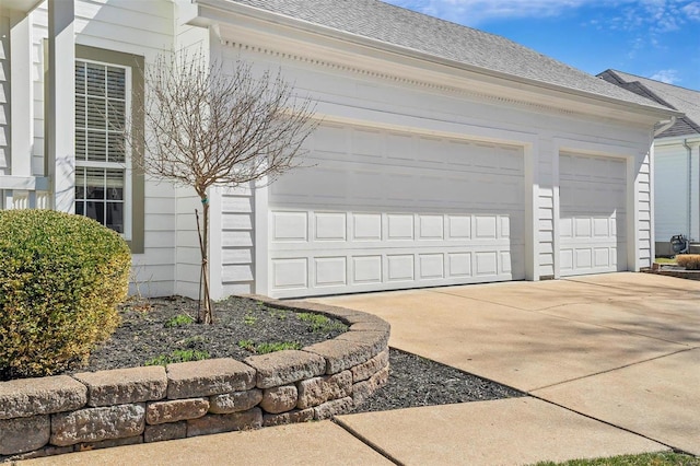 garage with driveway