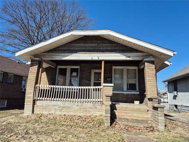 bungalow-style house featuring covered porch