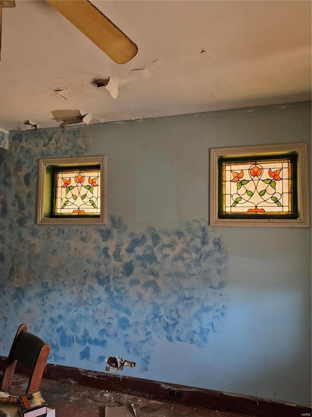 interior details featuring wallpapered walls