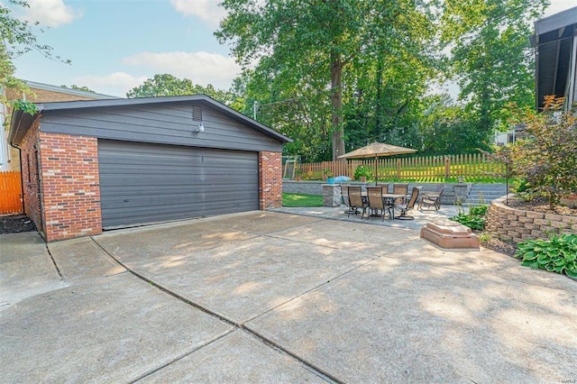 garage with fence