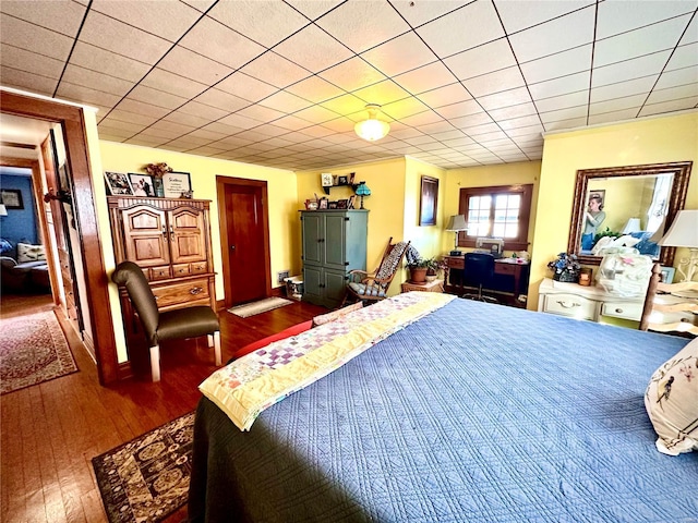 bedroom featuring wood-type flooring