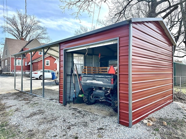 view of outdoor structure with an outdoor structure and fence