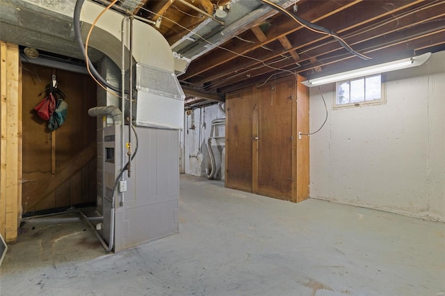 basement featuring heating unit