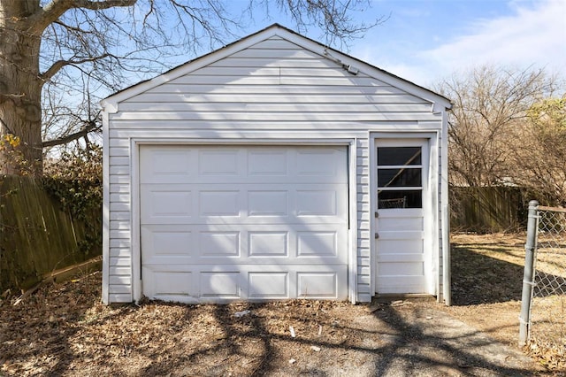 detached garage with fence