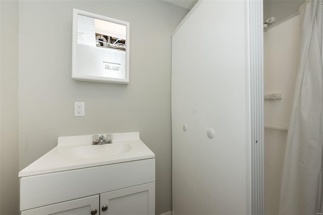 full bathroom with vanity