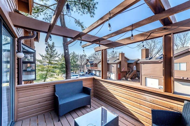 wooden terrace with a residential view