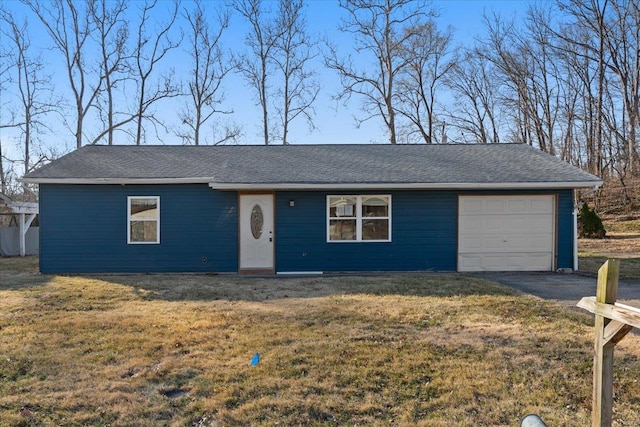 single story home with a front yard, an attached garage, and driveway