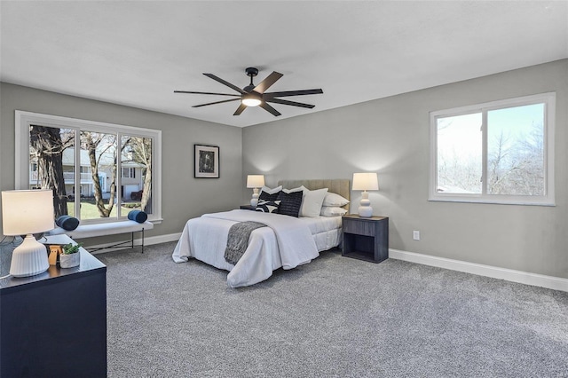 bedroom with carpet, baseboards, and ceiling fan