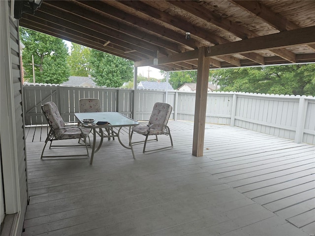 deck with outdoor dining space