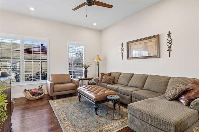 living room featuring recessed lighting, baseboards, a ceiling fan, and dark wood-style flooring