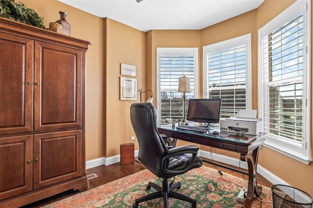 office featuring dark wood-style floors and baseboards