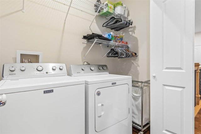 washroom featuring independent washer and dryer