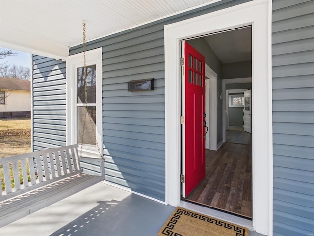 entrance to property with a porch