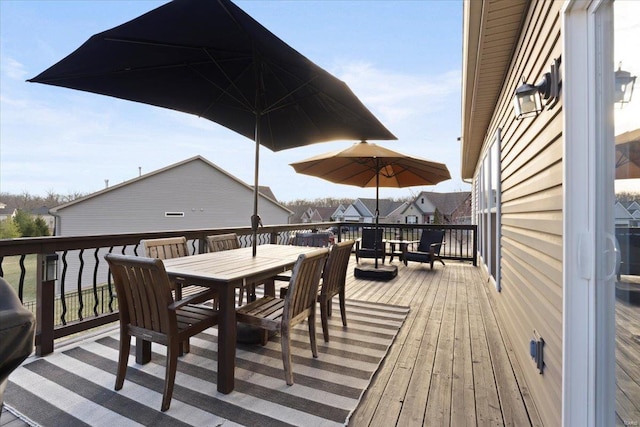 deck featuring outdoor dining space