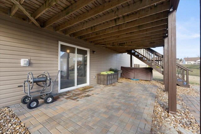 view of patio featuring stairs