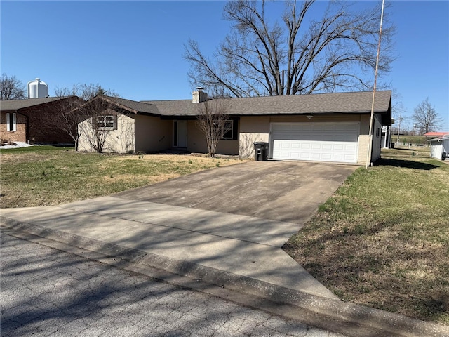 view of front of property featuring a front yard, stucco siding, a chimney, concrete driveway, and a garage