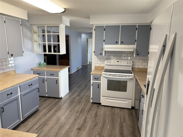 kitchen featuring dark wood finished floors, electric stove, gray cabinets, and under cabinet range hood