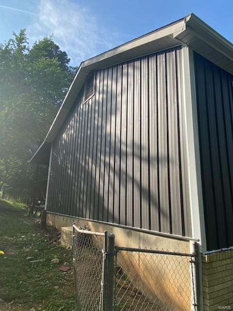 view of home's exterior featuring an outbuilding and an exterior structure