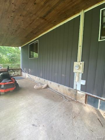 view of side of property with board and batten siding