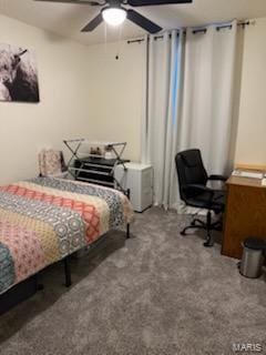 bedroom featuring carpet flooring and a ceiling fan