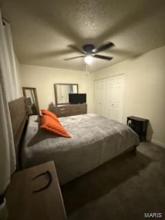 bedroom with carpet and a ceiling fan