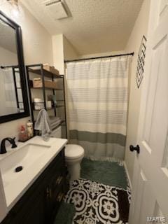 full bath with a shower with curtain, a textured ceiling, vanity, and toilet