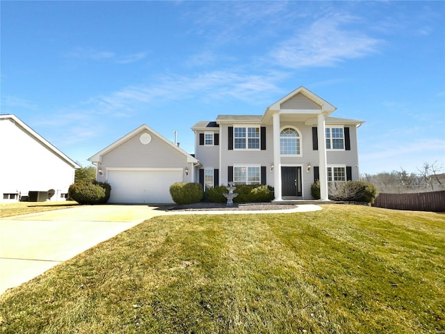 neoclassical home with concrete driveway, a garage, fence, and a front yard