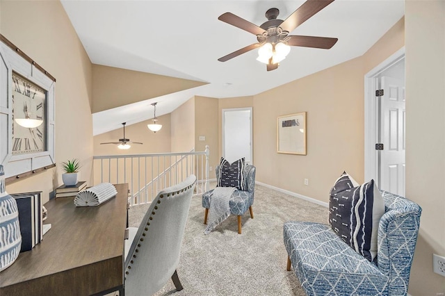 carpeted office with baseboards and vaulted ceiling