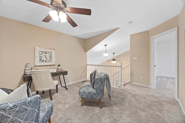 sitting room with carpet flooring and baseboards