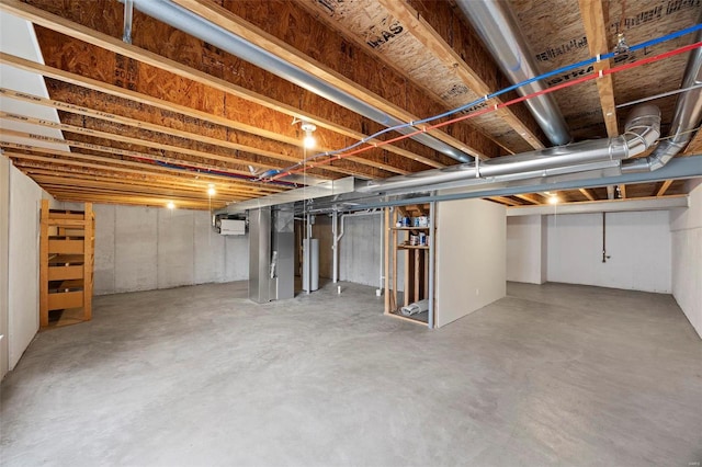 unfinished basement with water heater