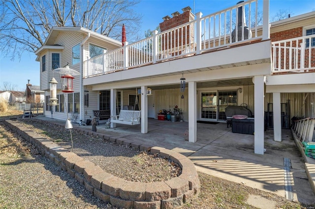 rear view of house with a patio area