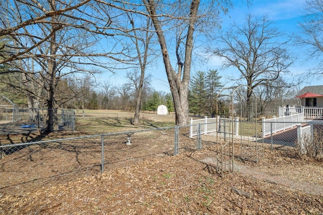 view of yard featuring fence