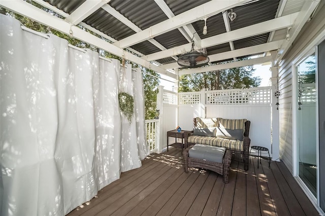 wooden terrace featuring an outdoor hangout area