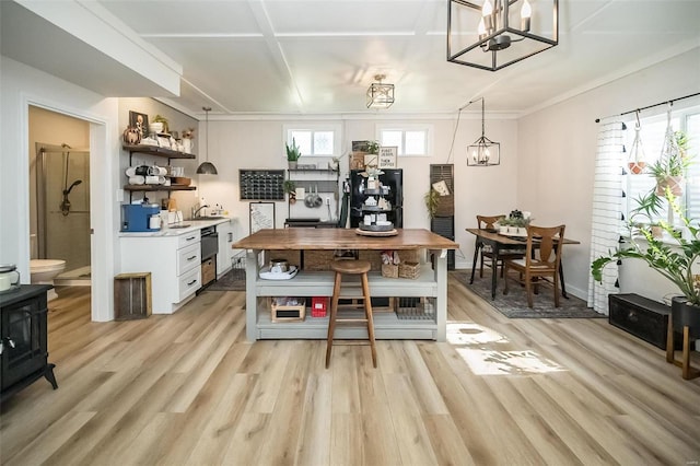 dining room with an inviting chandelier and light wood finished floors