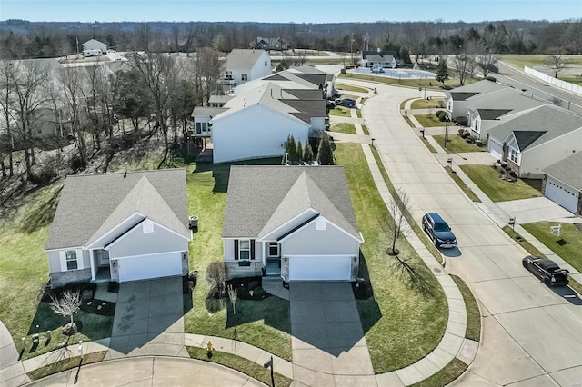 drone / aerial view with a residential view