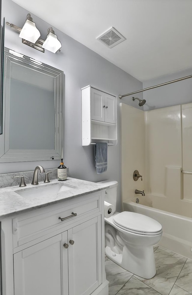 full bath featuring vanity, visible vents,  shower combination, toilet, and marble finish floor