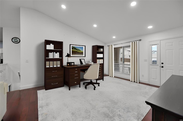 home office featuring lofted ceiling, recessed lighting, wood finished floors, and baseboards