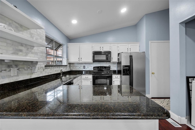 kitchen with black appliances, open shelves, a sink, a peninsula, and lofted ceiling