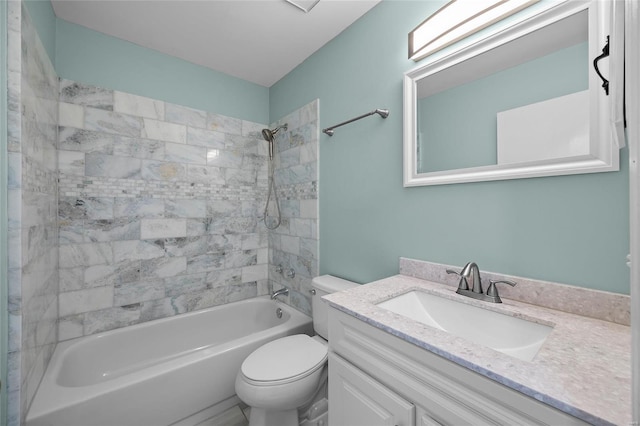 full bath featuring vanity, toilet, and shower / bathtub combination