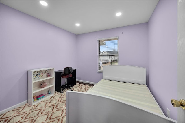 bedroom with recessed lighting and baseboards